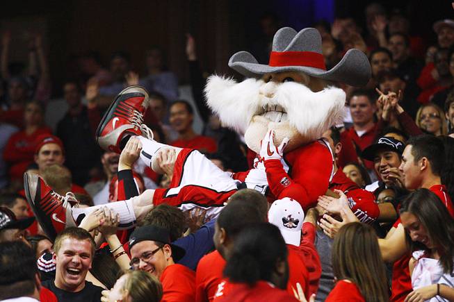 Hey Reb crowd surfs the student section during UNLV's game ...