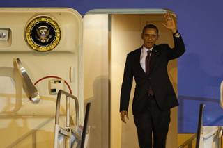 President Barack Obama arrives at McCarran International Airport in Las Vegas on Wednesday, Jan. 25, 2012.