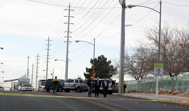 A homicide suspect who shot a Metro Police detective died early Wednesday morning after authorities returned fire, striking and killing him, police said. The officer-involved shooting happened near Washington Avenue and Michael Way in the northwest valley. The injured officer is in stable condition at University Medical Center.