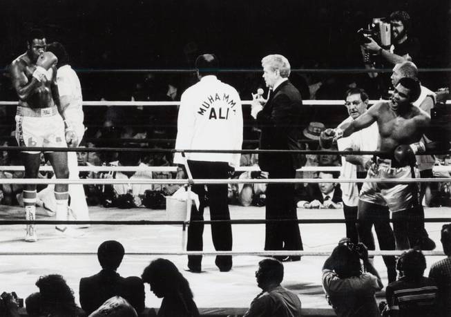 Larry Holmes, far left is introduced during the world heavyweight championship at Caesars Palace on October 2, 1980.