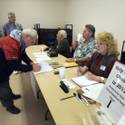 Caucus Searchlight