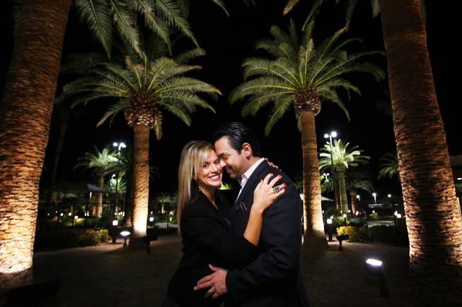 Amber Anderson and Cesar Salas pose near their home in Rhodes Ranch in Las Vegas on Friday, Feb. 10, 2012.