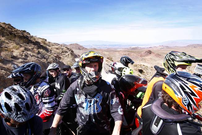 Riders take the shuttle up to the top of the canyon during Reaper Madness at Bootleg Canyon in Boulder City on Saturday, Feb. 18. 2012.