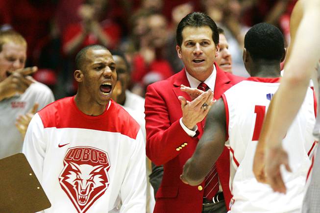 New Mexico coach Steve Alford claps as his team comes in for a time out during their game against UNLV Saturday, Feb. 18, 2012 at The Pit in Albuquerque, N.M. New Mexico won 65-45 to take sole possession of first place in the Mountain West.