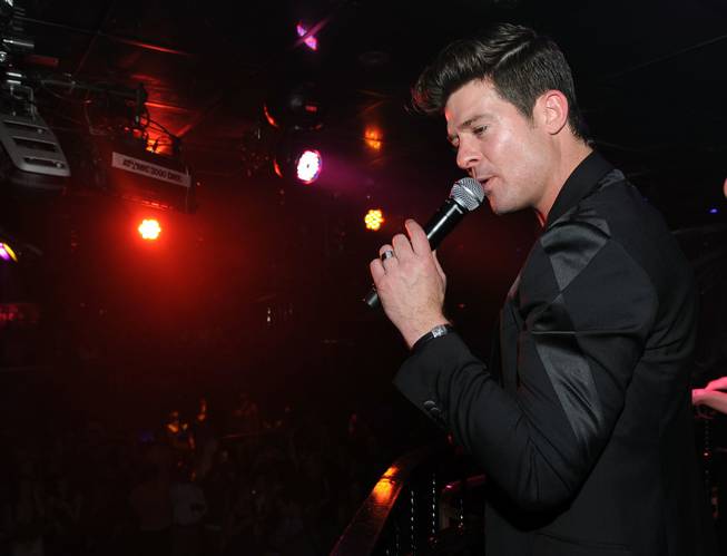 Robin Thicke performs at the Bank in the Bellagio on ...