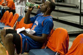 Bishop Gorman High's Shabazz Muhammad rehydrates on the sideline during the Gaels' 96-51 win over Northern Nevada's Hug High in the state championship game at Lawlor Events Center in Reno.