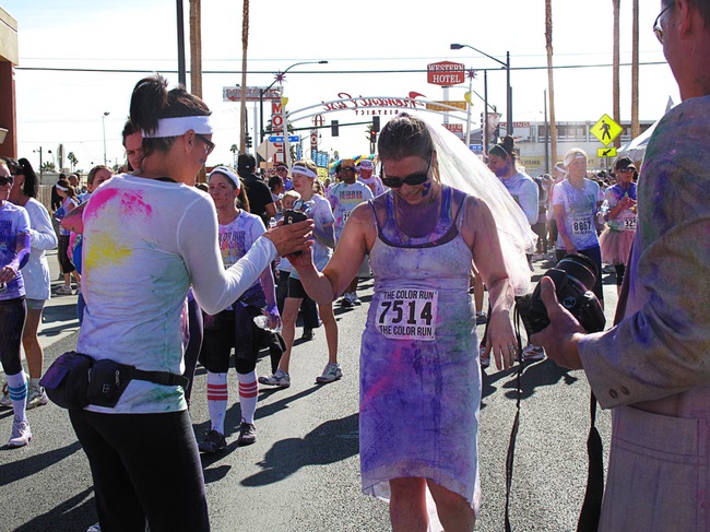 A woman in a bridal veil is shown during first Color Run in downtown Las Vegas, Saturday, Feb. 25, 2012. About 5,000 participants ran a 5K event which benefits the Three Square charity.