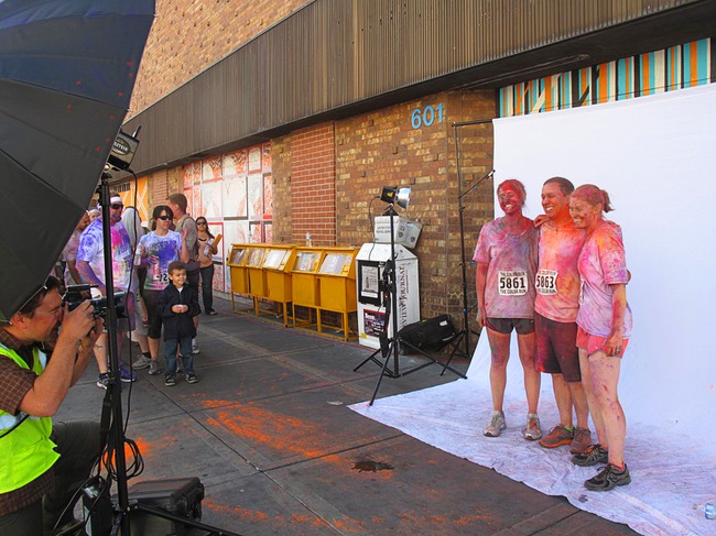 Runners poses for a photo during the first Color Run in downtown Las Vegas, Saturday, Feb. 25, 2012. About 5,000 participants ran a 5K event which benefits the Three Square charity.