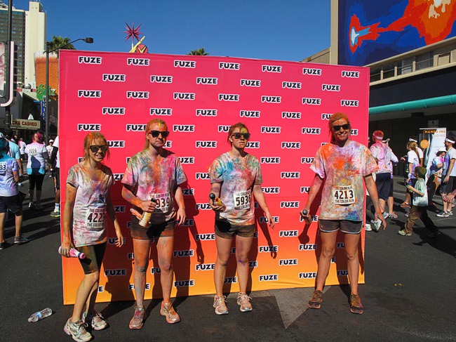 Runners pose for a photo during first Color Run in downtown Las Vegas, Saturday, Feb. 25, 2012. About 5,000 participants ran a 5K event which benefits the Three Square charity.