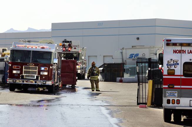 Firefighters with the North Las Vegas Fire Department on the scene of a fire at Secured Fibres, a recycling plant in North Las Vegas on Friday, March 2, 2012.