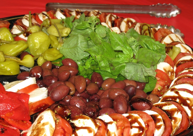 Italian-themed food is served to residents of the Las Vegas Rescue Mission and the homeless for their March "Dinner On Us" event.