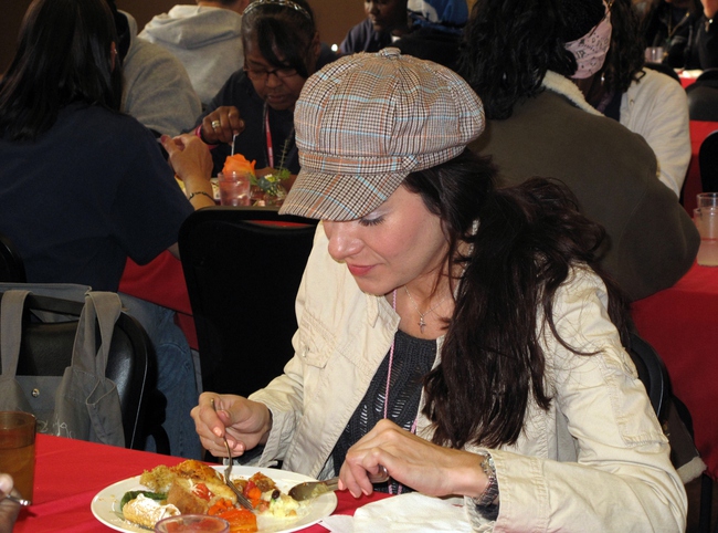 Residents of the Las Vegas Rescue Mission enjoy a free meal through the monthly "Dinner On Us" event. The March theme was Italian food.