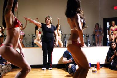 Denise Dinger holds posing practice with Dee’s Divas at Yak’s Fitness in Las Vegas on Saturday, March 3, 2012.