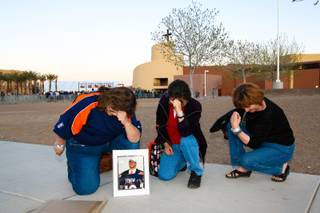 From left, Paula Dominguez, Ruth Butindaro and Marie Adams Tebow with their coveted photograph of Denver Broncos quarterback Tim Tebow after attending his appearance during the evening church service at Canyon Ridge Christian Church Saturday, March 3, 2012, in Las Vegas.