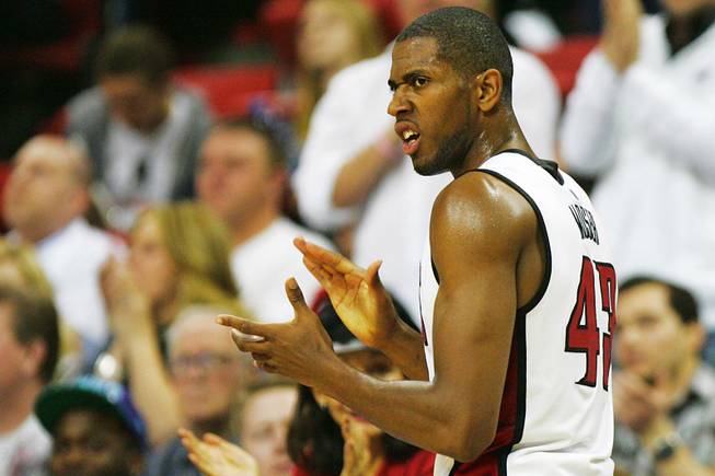 UNLV forward Mike Moser celebrates a call during the first ...
