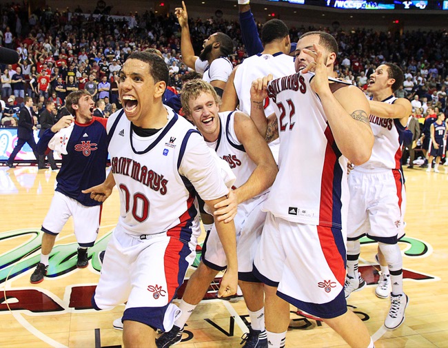 Saint Mary's Gaels' Brad Waldow (L) and teammates celebrate after beating the Gonzaga Bulldogs in 78-74 in overtime during the NCAA West Coast Conference Basketball Championship final in Las Vegas, Nevada March 5, 2012.