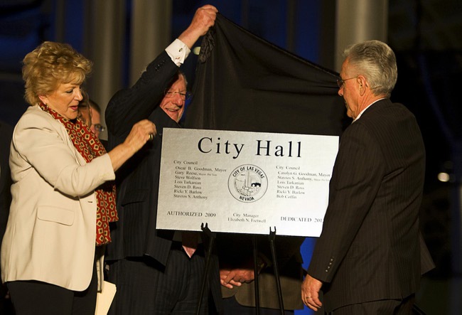 Las Vegas Mayor Carolyn Goodman, former Mayor Oscar Goodman and former City Councilman Gary Reese unveil a building dedication plaque during the dedication of the new city hall in downtown Las Vegas Monday, March 5, 2012.