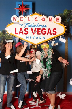 Confess Media's collection of photos take under replica of the Las Vegas Welcome Sign, set up near the baggage claim at McCarran International Airport, March 9, 2012.