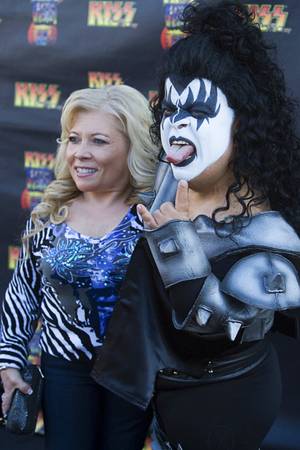 Kiss by Monster Mini Gold spokesman Brian "Lowercase g" Thomas and "Lowercase s" arrive on the black carpet during the grand opening of Kiss by Monster Mini Golf at 4503 Paradise Road Thursday, March 15, 2012.