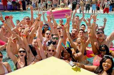 It wasn’t too cold for revelers to get in the Palms pool to celebrate spring break for MTV’s cameras in Las Vegas on Tuesday, March 20, 2012. 