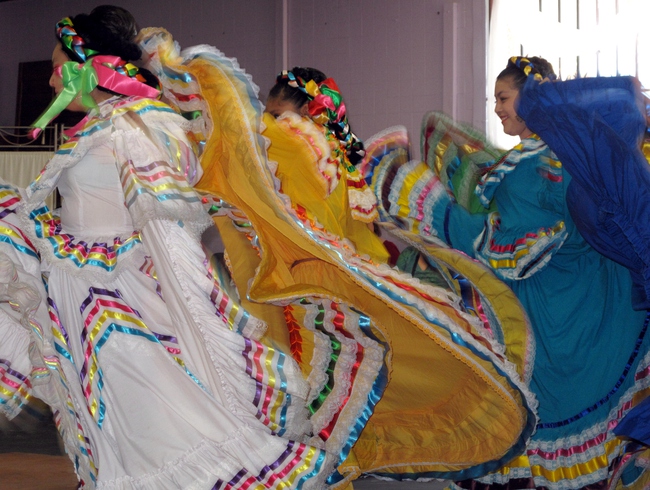 Young girls dance for a small crowd at a ceremony to celebrate the renaming of a North Las Vegas street to 