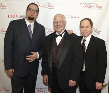 Nevada Entertainer/Artist Hall of Fame inductees Penn & Teller flank UNLV College of Fine Arts Dean Jeff Koep during the Ninth Annual Hall of Fame dinner at UNLV on Thursday, March 22, 2012.