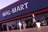 Shoppers enter Wal-Mart on Tropicana Avenue near Pecos Road. 