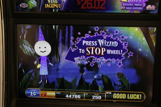 A screen is displayed on a Cash Wizard video slot machine by Bally Technologies is displayed in the company's showroom Thursday, March 29, 2012.