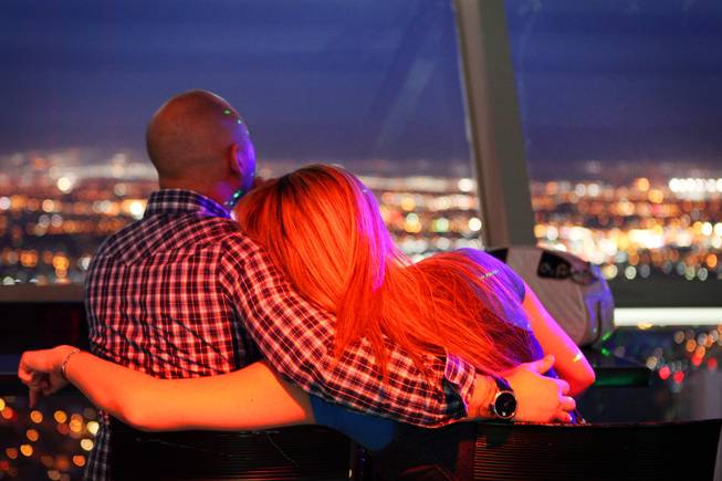 People enjoy the view from the Observation Deck at the Stratosphere on Thursday, April 5, 2012.