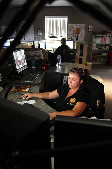 Communications specialist Melanie Straeter dispatches units at Las Vegas Fire ...