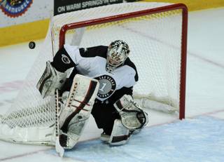 Goaltender Mitch O'Keefe deflects a first period shot with is blocker during game one of the Western Conference Semi-Finals against the Idaho Steelheads on Monday night at the Orleans Arena.