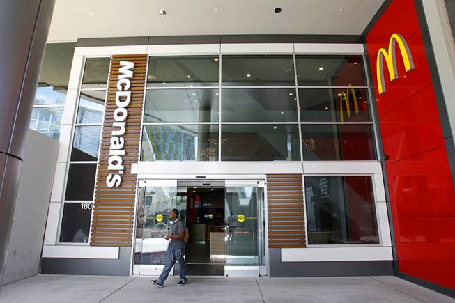 A customer leaves the new Metro McDonald's at Harmon Avenue ...