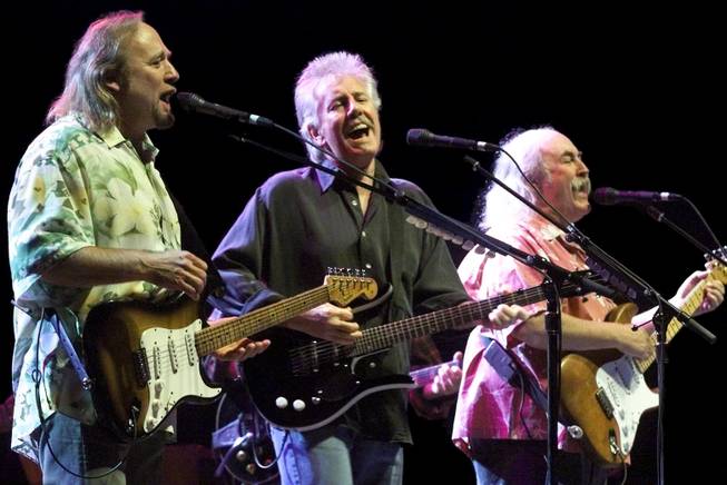 From left, Stephen Stills, Graham Nash, and David Crosby perform the song "Carry On" at the MGM Grand Garden Arena Saturday, February 19, 2000. The band, also playing with Neil Young, is on its first U.S. tour since 1974 to promote the new album "Looking Forward."