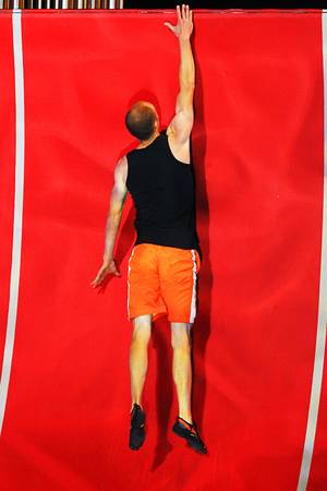 A competitor tries to make it out of a half pipe during the taping of the finals of American Ninja Saturday, April 21, 2012.