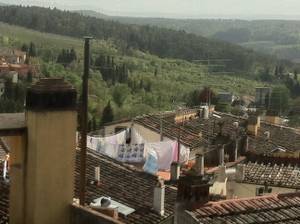 Laundry hanging in dwellings in the village of Impruneta in the Tuscan region of Italy.