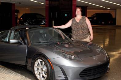 Maryellen Cobb of New York won a $150,000 electric Tesla Roadster on a slot machine at the Cosmopolitan on the Las Vegas Strip.