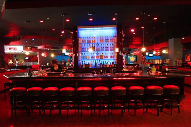 This is the main bar at Drink & Drag, a new bar at Neonopolis featuring bowling and drag queens Thursday, April 26, 2012.