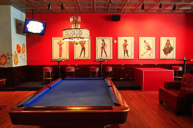 This is the billiards area at Drink & Drag, a new bar at Neonopolis featuring bowling and drag queens Thursday, April 26, 2012.