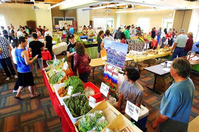 The farmers market at the Springs Preserve takes over one of its buildings Thursday, April 26, 2012.