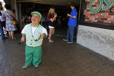 Brian Thomas, also known as Lucky the leprechaun, prepares to start his promotional banter during the Final Countdown party at O’Sheas casino Sunday, April 29, 2012. The casino will close at noon April 30 to make room for the Linq project, a $500 million dollar entertainment, retail and dining corridor set to open in 2013. A new version of O’Sheas will be rebuilt inside Linq, officials said.