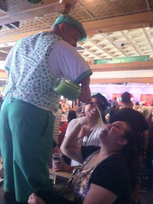 Lucky the Leprechaun (aka Brian Thomas) pours shots of love at O'Sheas.