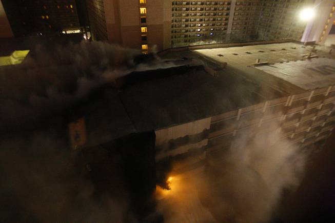 The seven-level parking garage of O'Sheas Casino is imploded early ...