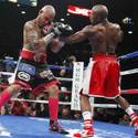 Mayweather takes title from Cotto