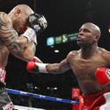 Mayweather takes title from Cotto
