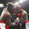 Mayweather takes title from Cotto