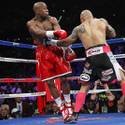 Mayweather takes title from Cotto