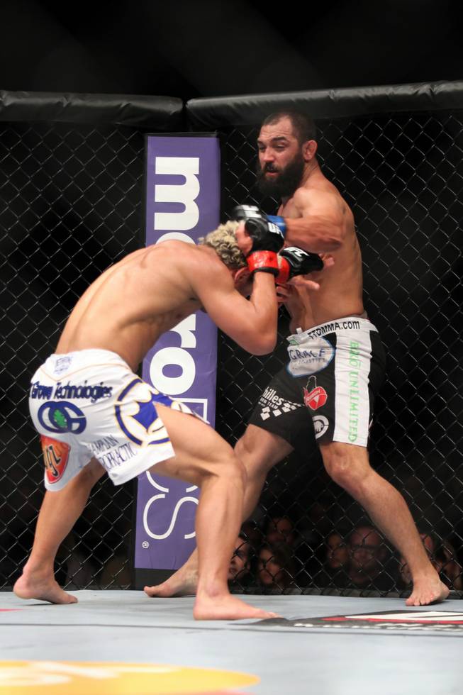 Johny Hendricks, right, lands a punch against Josh Koscheck during their welterweight bout at UFC on Fox at the Izod Center in E. Rutherford, N.J., on Saturday, May 5, 2012. Hendricks won via three-round split decision.