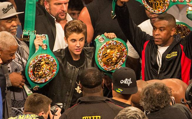 Justin Bieber, 50 Cent and Floyd Mayweather Jr.