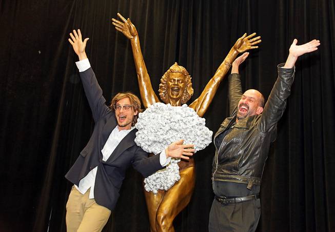 Actor Matthew Gray Gubler, left, star of "Criminal Minds," poses with sculptor Steve Liguori, right, at the Las Vegas Convention Center on Wednesday, May 9, 2012. The Miss Atomic Bomb statue by Liguori, a re-creation of an iconic photo taken by Las Vegas News Bureau photographer Don English on May 24, 1957, was unveiled during a luncheon honoring the 65th anniversary of the LVNB. The LVNB was formed to promote Las Vegas through photos. 