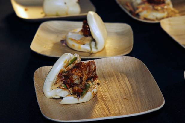 Honey-fied chicken buns are displayed during the Vegas Uncork'd "Follow That Truck" food festival at the Bellagio Thursday May 20, 2012. Celebrity chefs added to the gourmet fare from more than a dozen food trucks for the festival outside under the lights at Bellagios Hidden Drive.